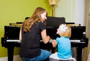 parent and child at piano